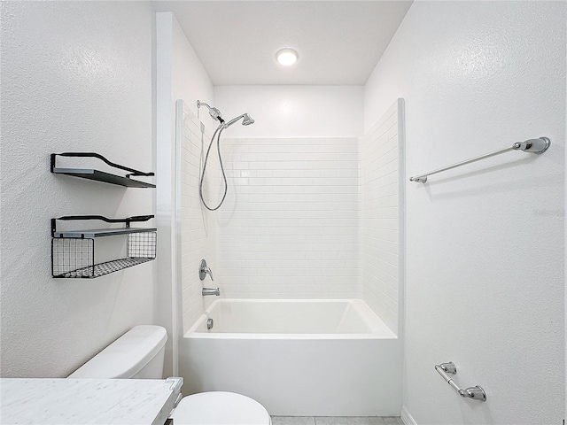 full bathroom featuring vanity, washtub / shower combination, and toilet