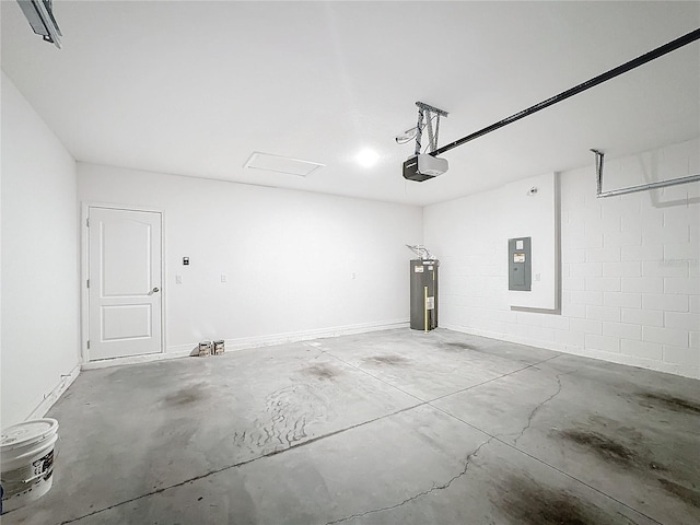 garage with a garage door opener, electric water heater, and electric panel