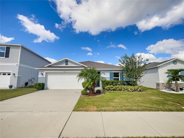 ranch-style house with a garage and a front lawn