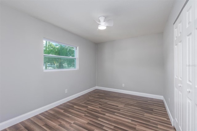 spare room featuring dark hardwood / wood-style floors