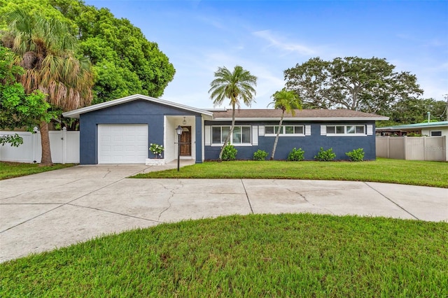 ranch-style house with a front yard and a garage