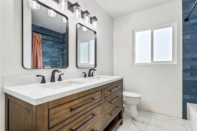 full bathroom featuring vanity, toilet, and shower / bath combination with curtain