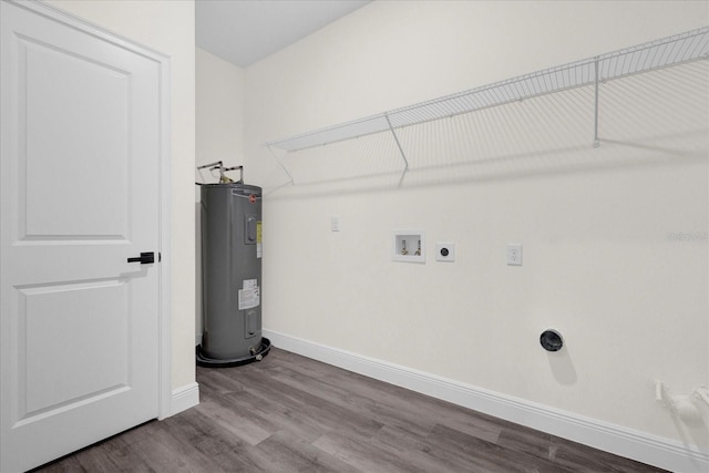 clothes washing area featuring electric water heater, wood-type flooring, washer hookup, and hookup for an electric dryer