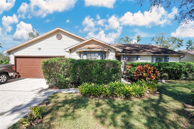 ranch-style home with a front lawn and a garage