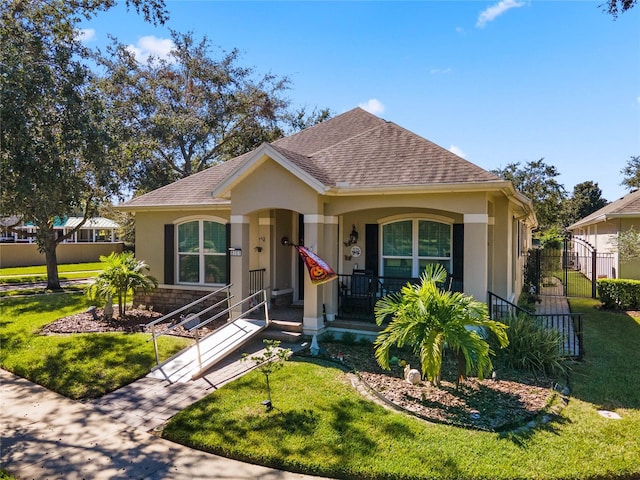 bungalow-style house featuring a front lawn and a porch