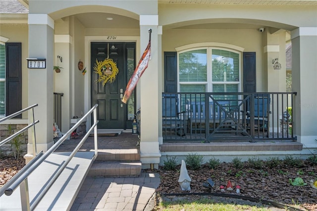 entrance to property with a porch