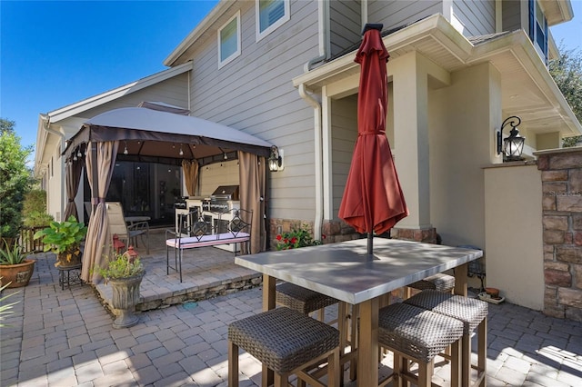 view of patio featuring a gazebo