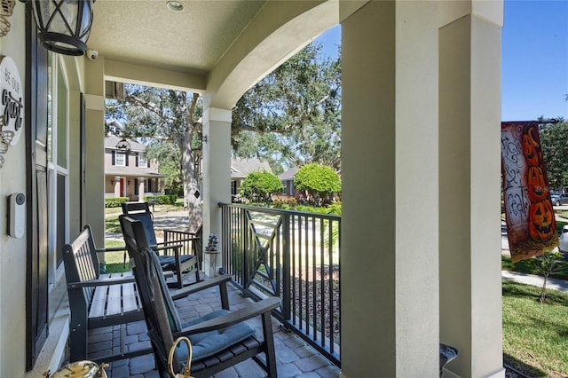 balcony featuring a porch