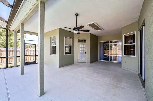 view of patio featuring ceiling fan