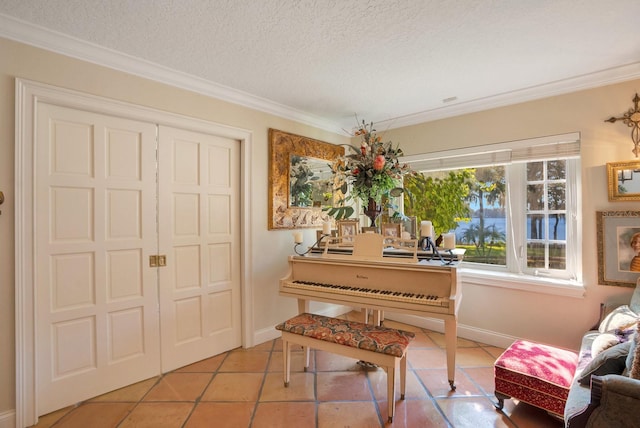 misc room with crown molding, a textured ceiling, and light tile patterned flooring