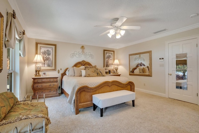 carpeted bedroom featuring crown molding and ceiling fan