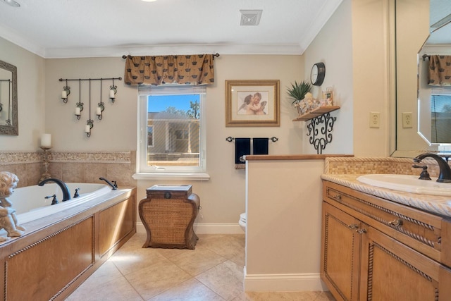 bathroom featuring toilet, tile patterned floors, a bathing tub, vanity, and crown molding