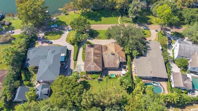 birds eye view of property featuring a water view