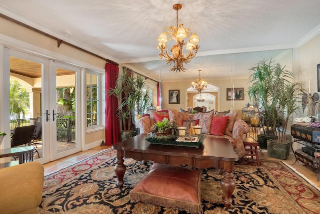 tiled dining area with french doors, a notable chandelier, ornamental molding, and a textured ceiling