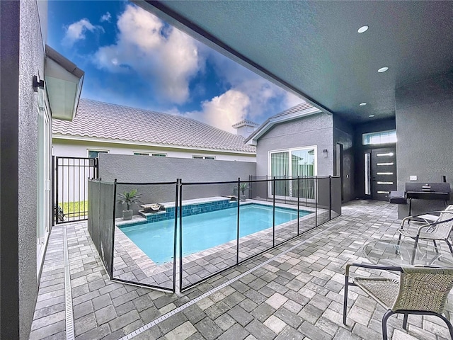 view of pool with a patio