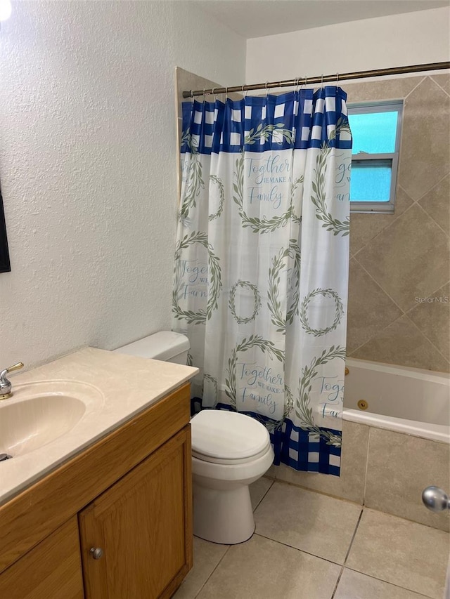 full bathroom with vanity, toilet, tile patterned flooring, and shower / tub combo with curtain