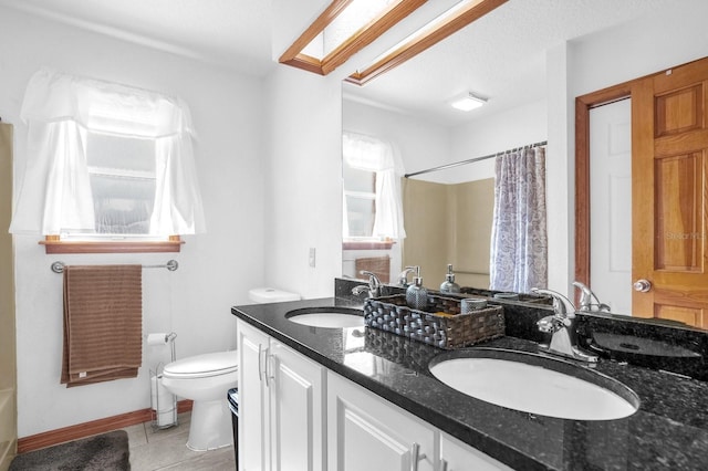 full bathroom featuring vanity, shower / bath combination with curtain, toilet, and tile patterned flooring