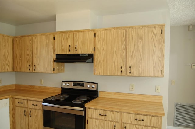 kitchen featuring stainless steel range with electric stovetop, light brown cabinets, and exhaust hood