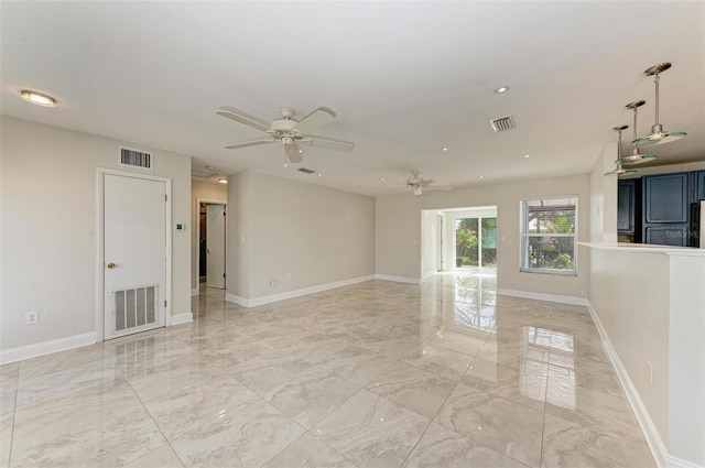 spare room with ceiling fan