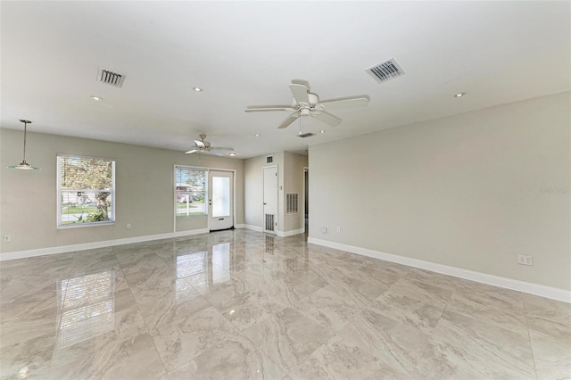 spare room with ceiling fan