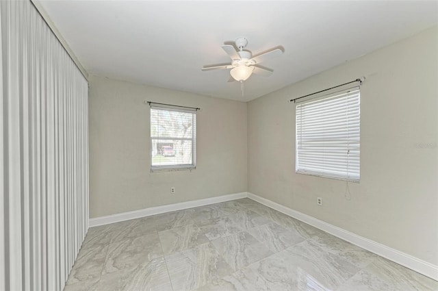 empty room featuring ceiling fan