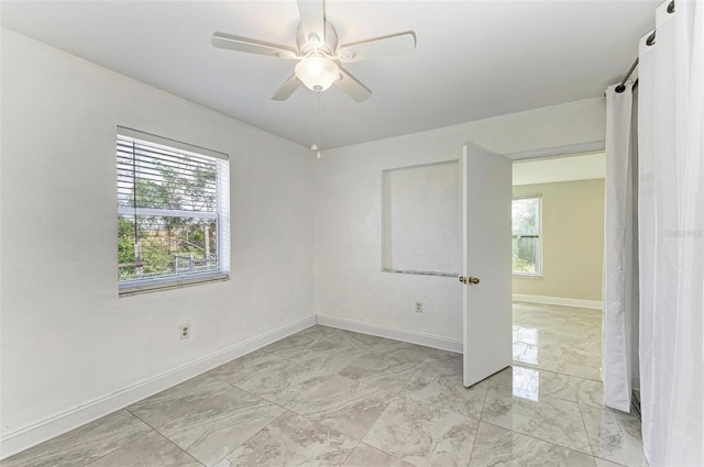 empty room with ceiling fan