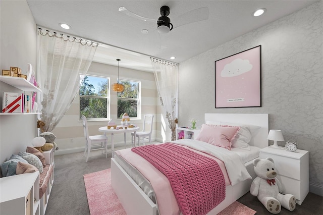 bedroom with ceiling fan and carpet floors