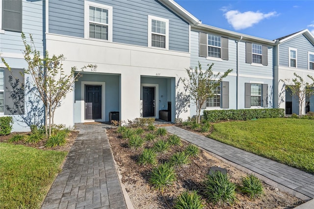 view of front of home with a front yard