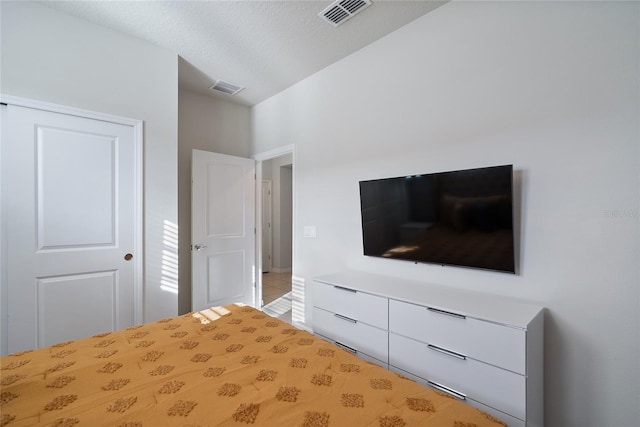 unfurnished bedroom featuring a textured ceiling