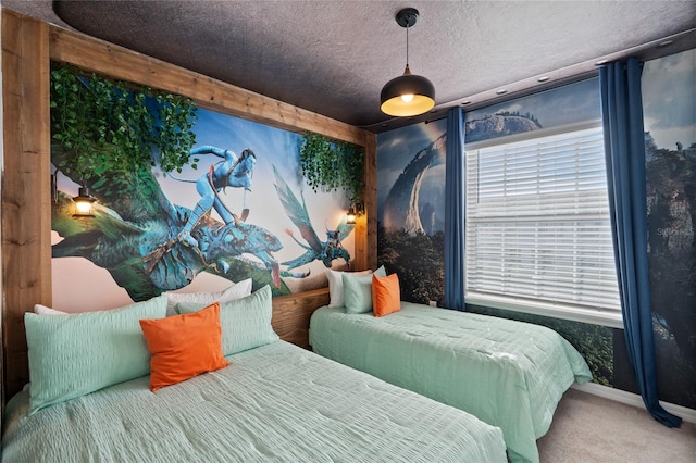 bedroom featuring a textured ceiling and carpet flooring