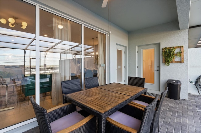 view of patio / terrace featuring ceiling fan