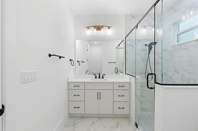 bathroom featuring vanity and an enclosed shower