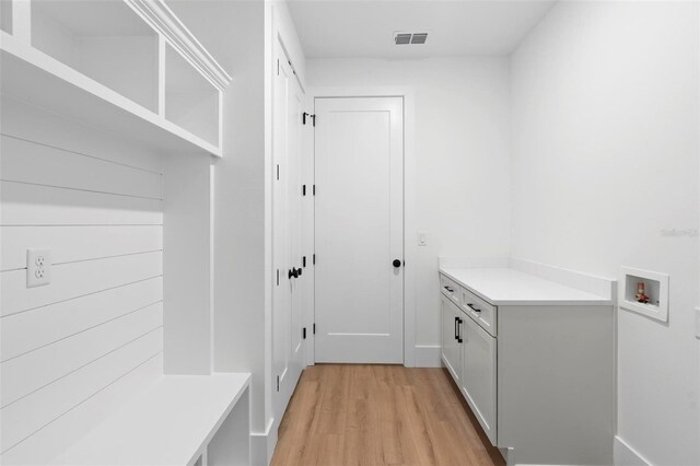 4190 Rossmore Dr, Orlando, FL 32810 - mudroom featuring light wood-style flooring