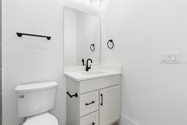 4190 Rossmore Dr, Orlando, FL 32810 - bathroom with vanity and toilet