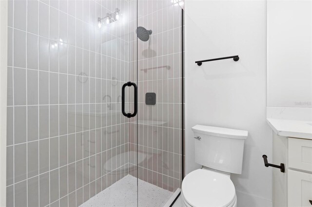 4190 Rossmore Dr, Orlando, FL 32810 - bathroom featuring a stall shower and toilet