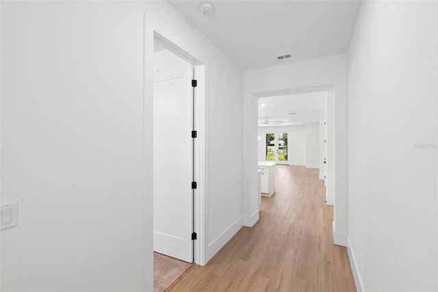 corridor featuring light wood-type flooring