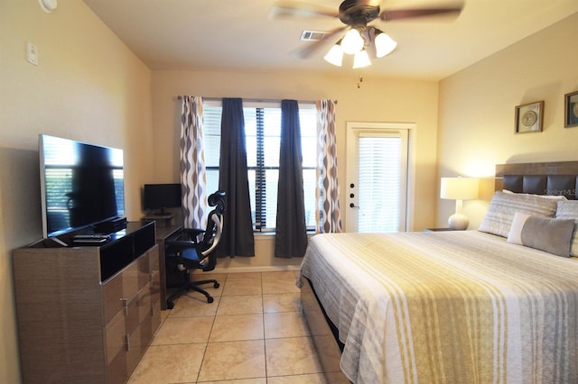 bedroom featuring light tile patterned floors and ceiling fan