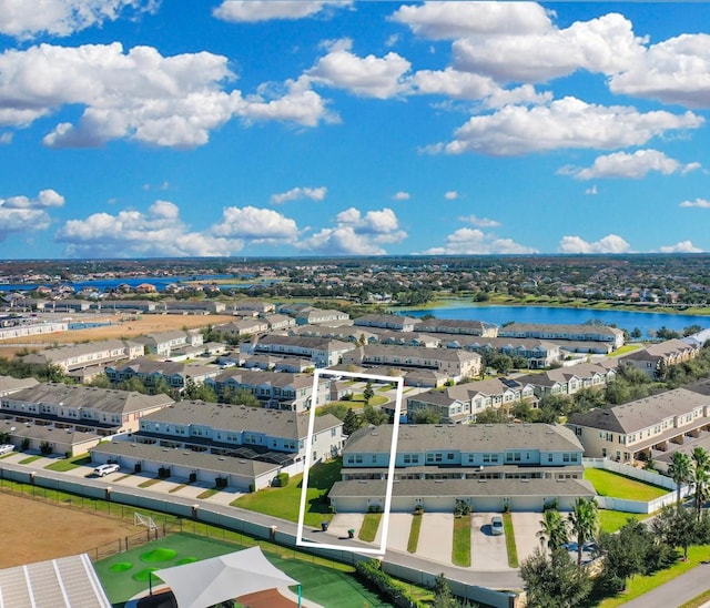 drone / aerial view with a water view