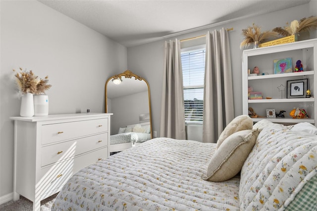 bedroom featuring carpet flooring