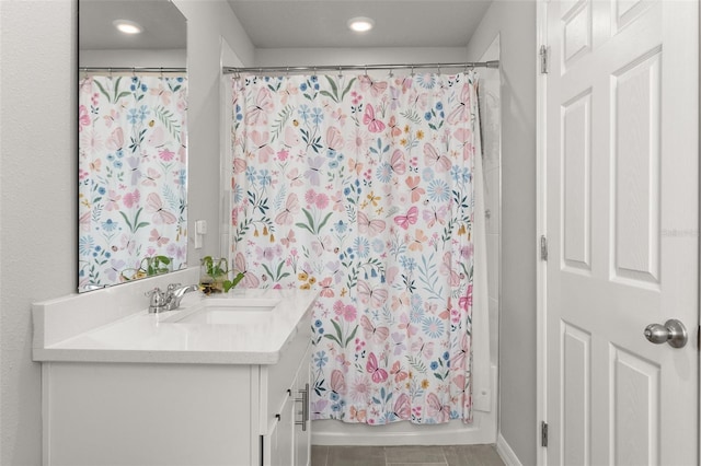 bathroom with vanity and shower / tub combo with curtain