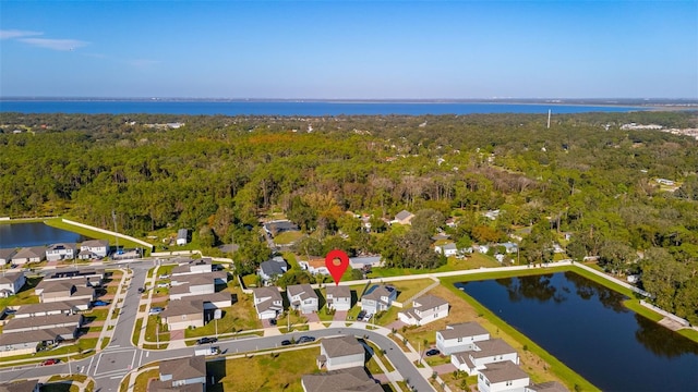 drone / aerial view featuring a water view