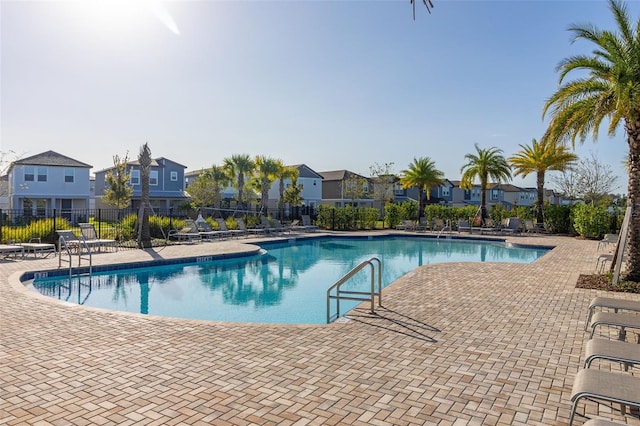 view of swimming pool featuring a patio area