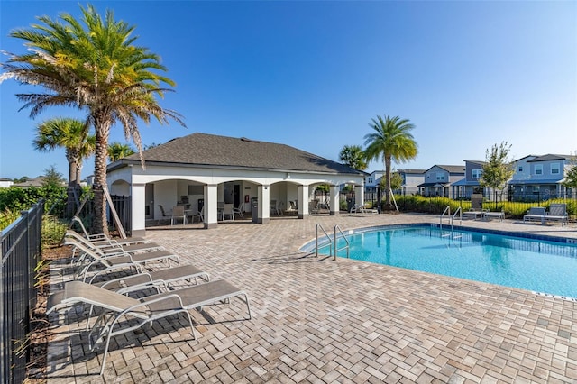 view of swimming pool featuring a patio