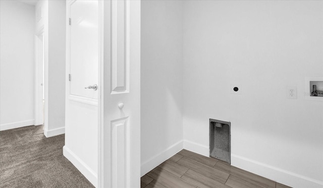 clothes washing area featuring hookup for an electric dryer, hookup for a washing machine, and carpet flooring