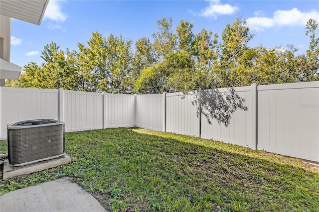 view of yard featuring central AC