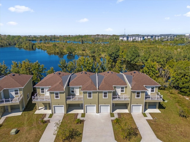 drone / aerial view featuring a water view