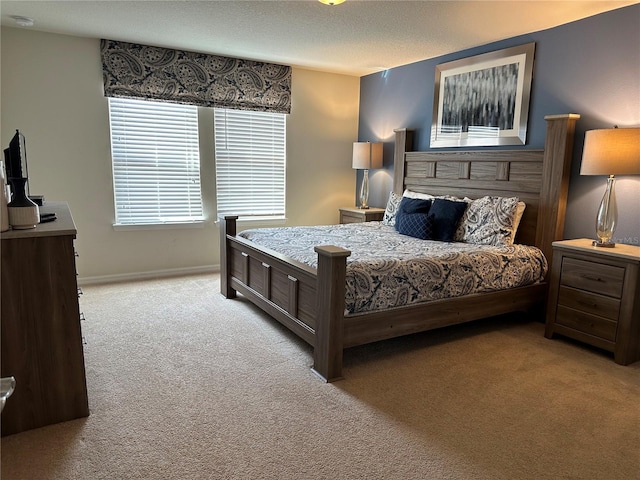 carpeted bedroom with a textured ceiling