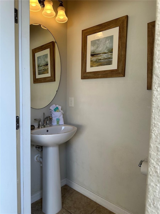 bathroom featuring tile patterned floors and sink