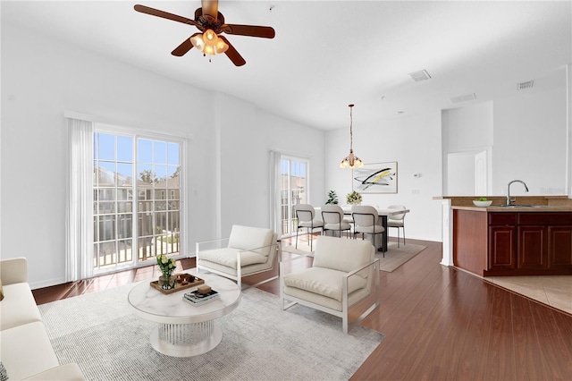 3010 San Jacinto Cir Unit 3010, Sanford, FL 32771 - living room featuring wood finished floors and ceiling fan