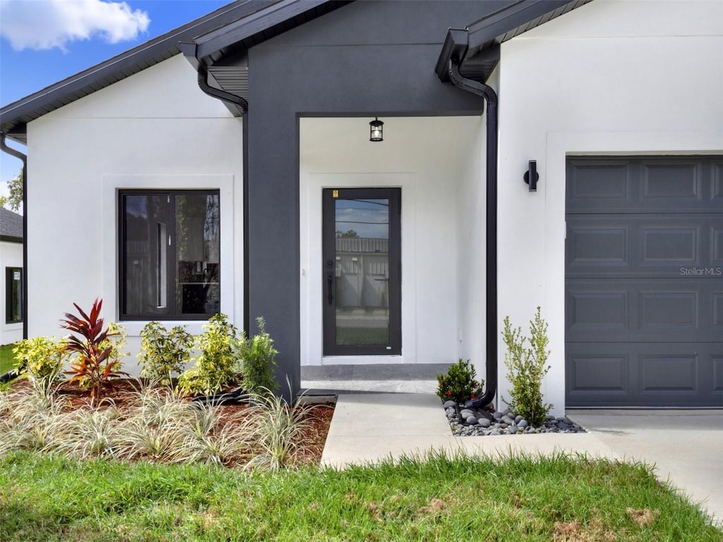 property entrance featuring a garage